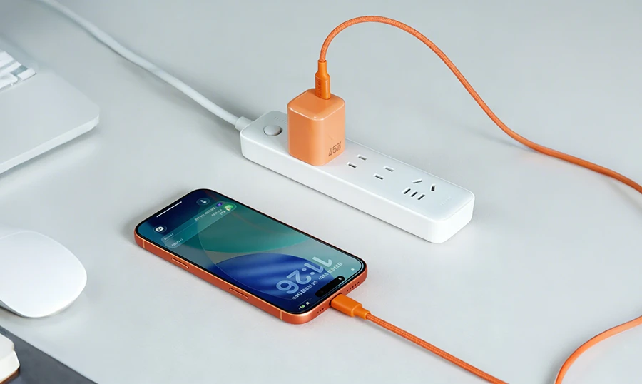 WECENT 45W orange charger in use on a desk