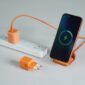 Portable GaN charger with foldable pins and modern cube-shaped design